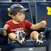 Michigan fan Max Brodsky, 2, of Penn., checks out the new stadium seating during an open house at Crisler Arena on Friday evening. Melanie Maxwell I AnnArbor.com